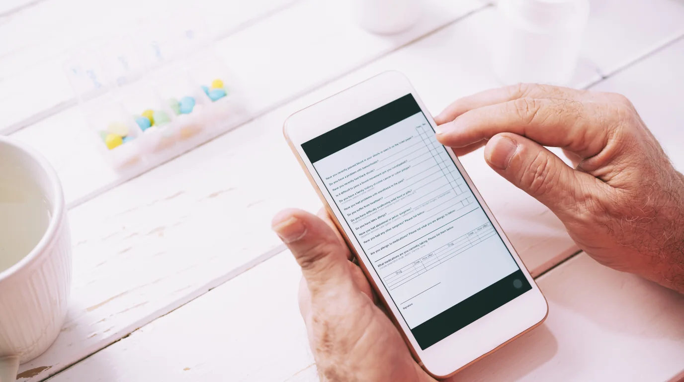 Smartphone displaying address book contact cards and profile lists