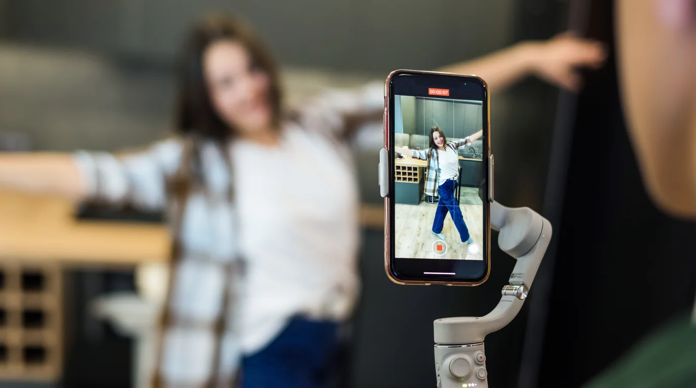 Smartphone interface recording 4K video displaying high bitrate footage