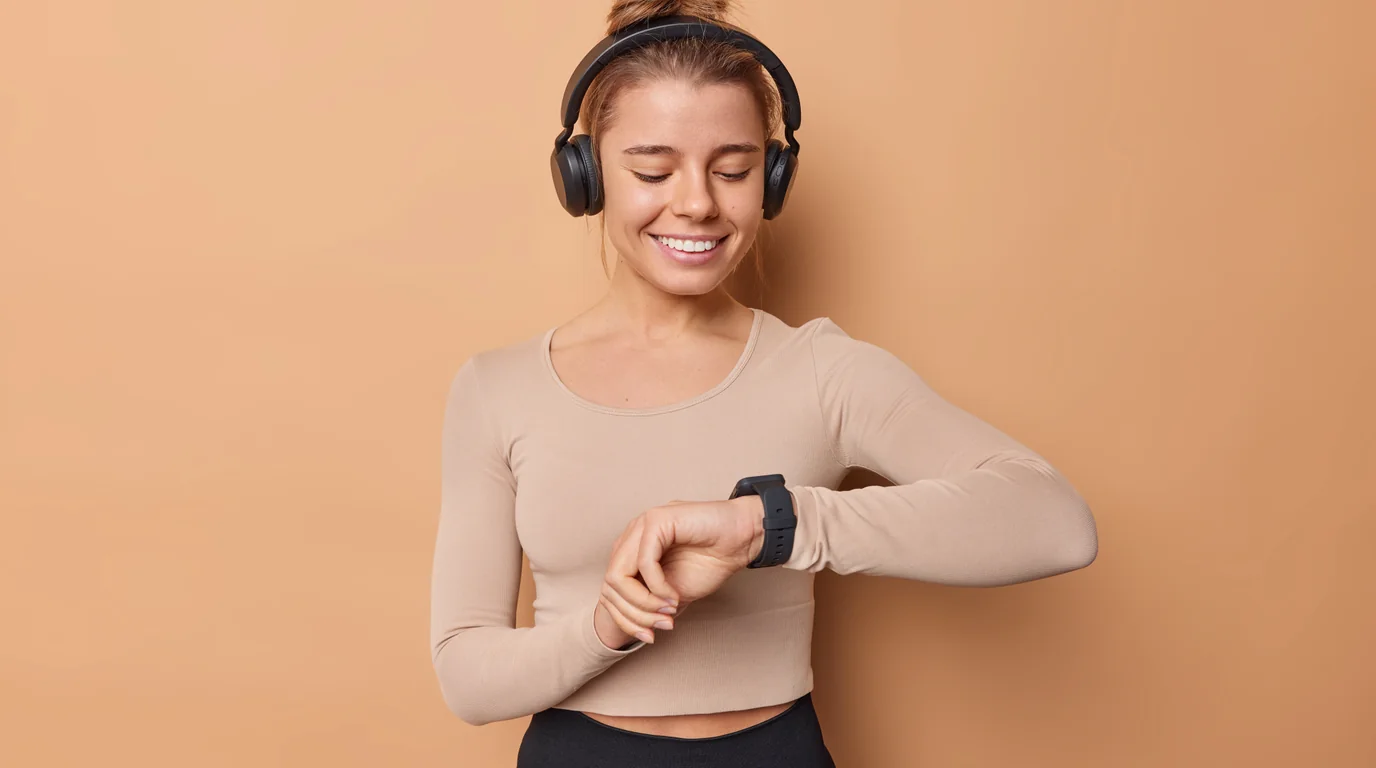 Sleek fitness tracking band on wrist during an intense workout training session